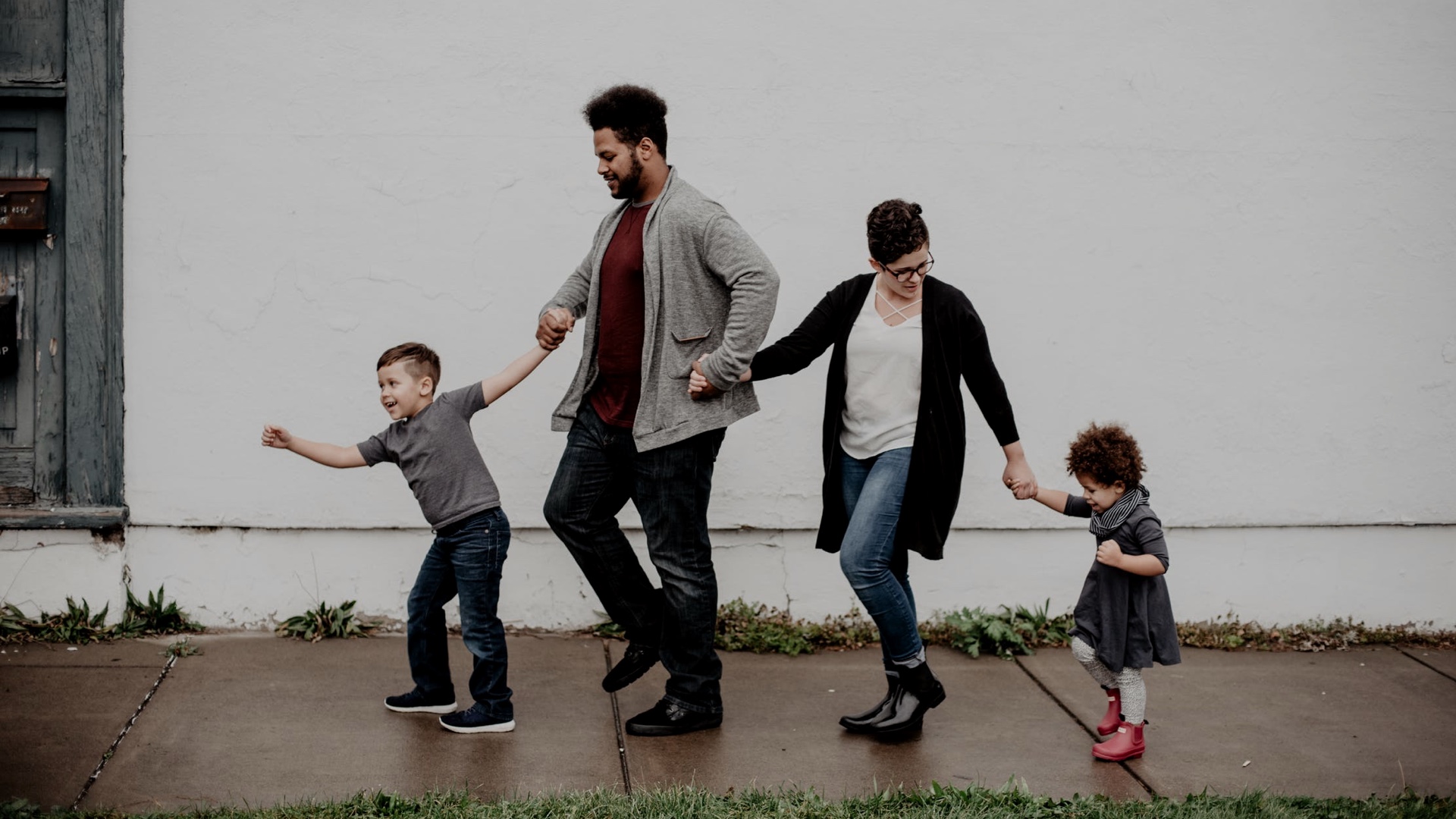Family walking holding hands
